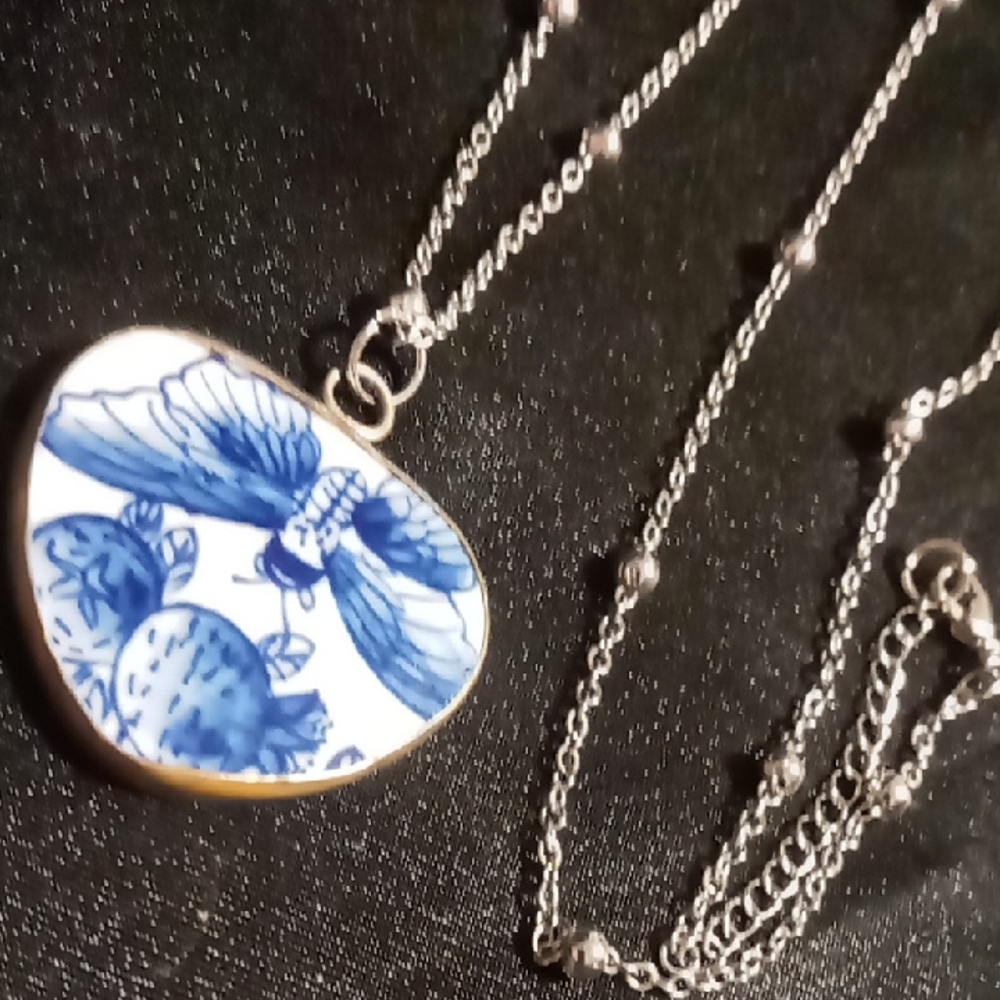 Vibrant Blue Floral & butterfly ceramic Pendant Necklace. 28 inches long